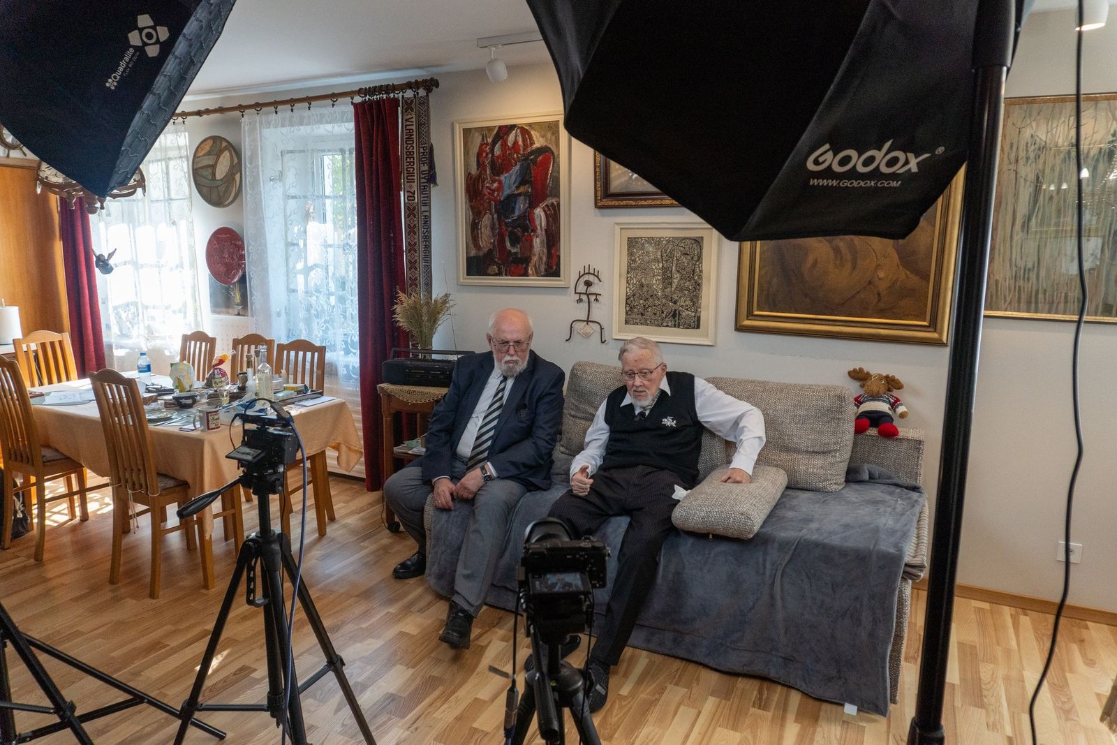 Filming equipment and lights set up in a client's space
